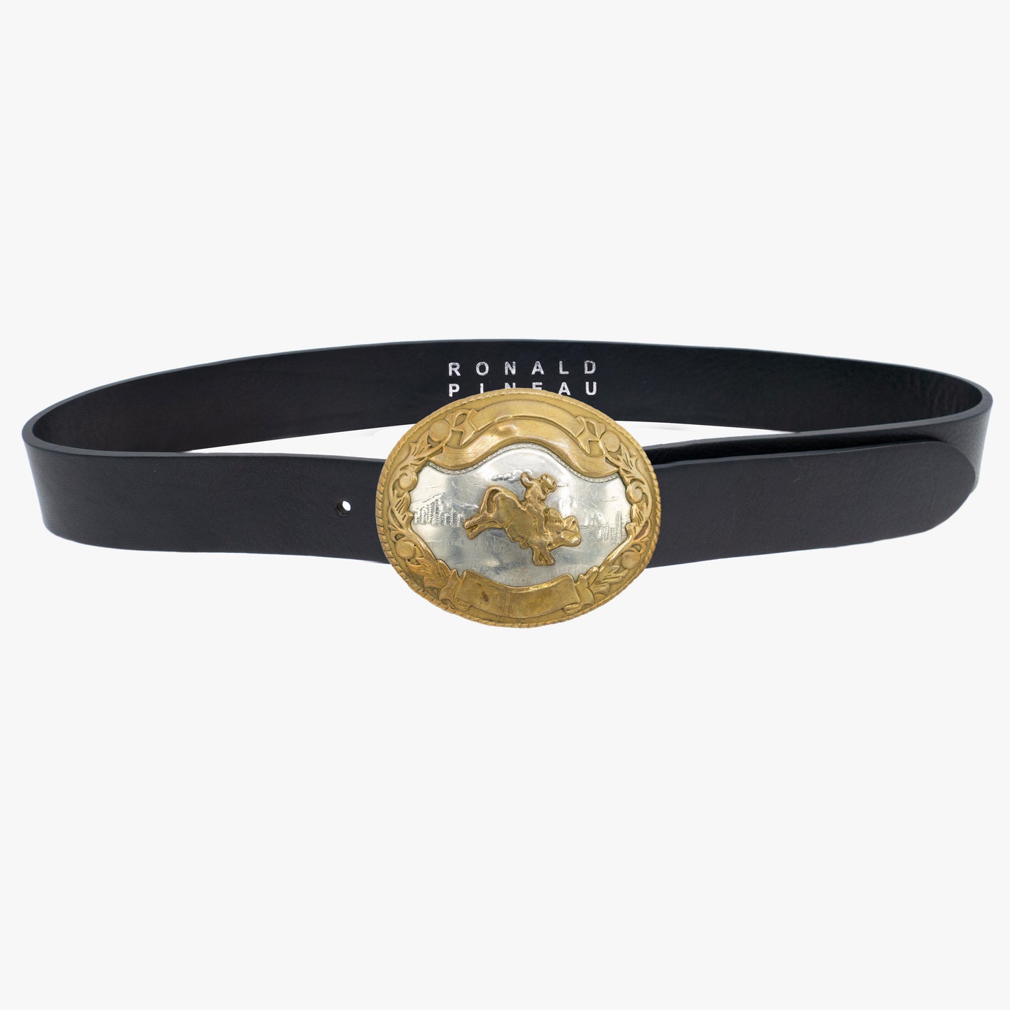Vintage rodeo buckle and leather belt