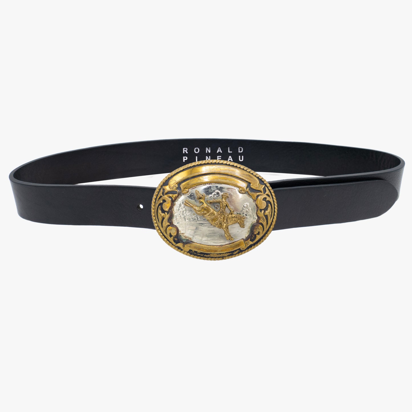 Vintage rodeo buckle and leather belt