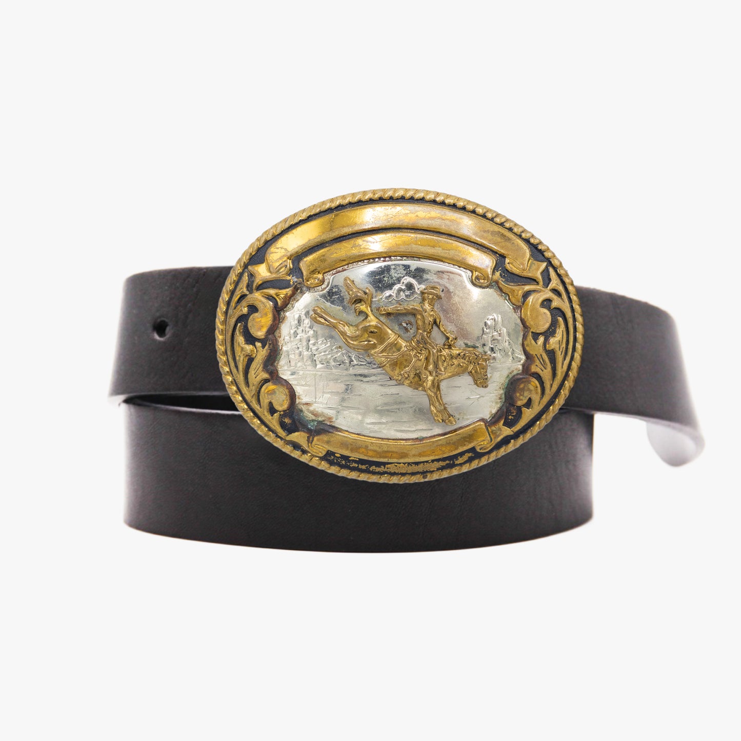 Vintage rodeo buckle and leather belt