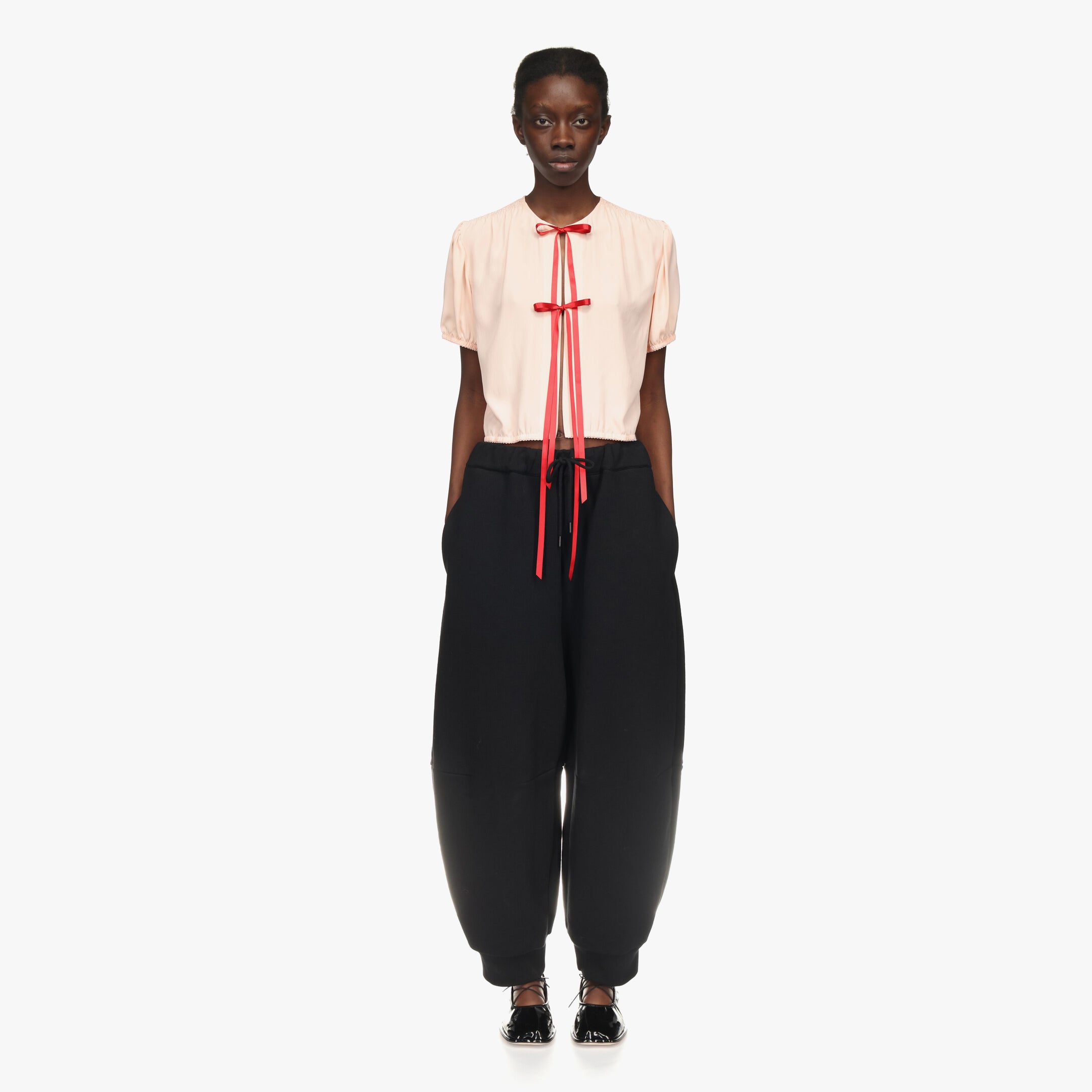 Simone Rocha Joggers With Daisy Embellishment