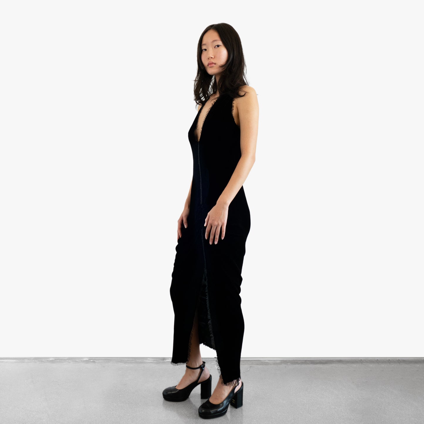 Model wearing a black velvet dress