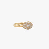 A gold eye-shaped ring with a pavé diamond halo and a central round diamond, shown on a light gray background.