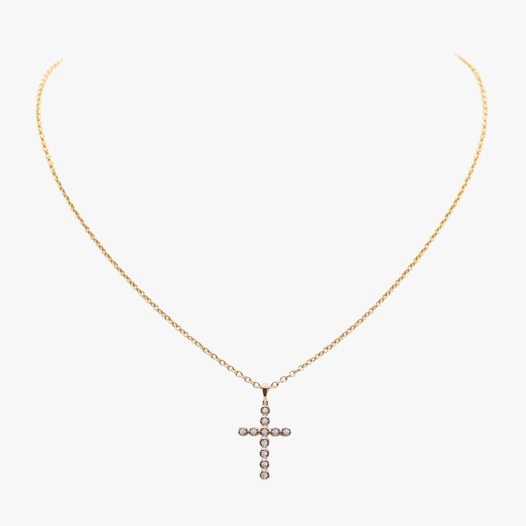 14K gold cross necklace set with diamonds by AM Studio on a 14K gold chain.