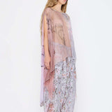  Barbara Bologna Sheer Print Top, side view — sheer watercolor print cape-top in blush pink, rose, and lavender with bateau neckline and dramatic draped panels
