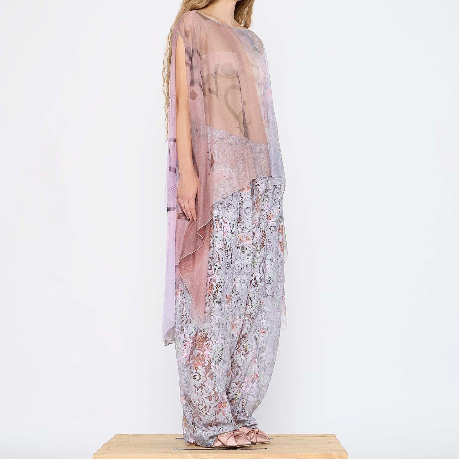  Barbara Bologna Sheer Print Top, side full-body view — sheer watercolor print cape-top in blush pink, rose, and lavender with bateau neckline and dramatic draped panels