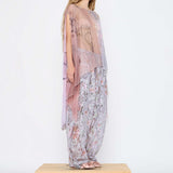 Barbara Bologna Sheer Print Top, side full-body view — sheer watercolor print cape-top in blush pink, rose, and lavender with bateau neckline and dramatic draped panels