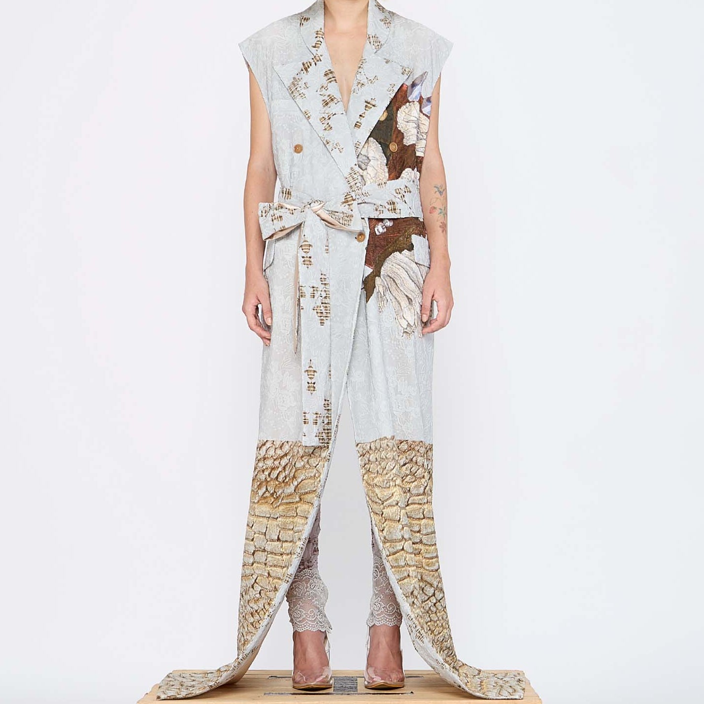 Barbara Bologna Mixed Print Textured Stolla Vest, front view — sleeveless cotton vest with a ollage print featuring crocodile, plaid, and floral patterns, belted at waist