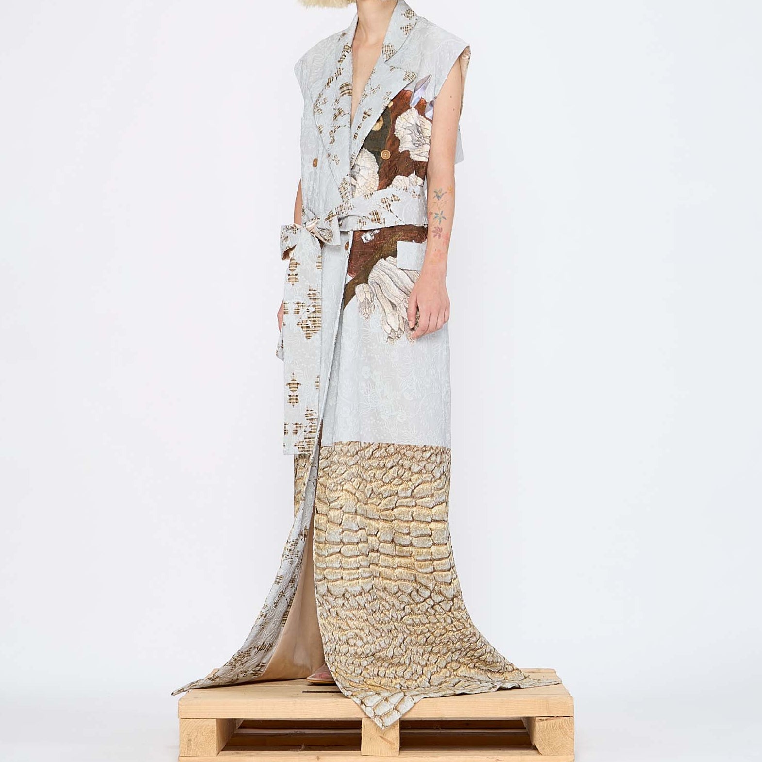 Barbara Bologna Mixed Print Textured Stolla Vest, side view — sleeveless cotton vest with a ollage print featuring crocodile, plaid, and floral patterns, belted at waist