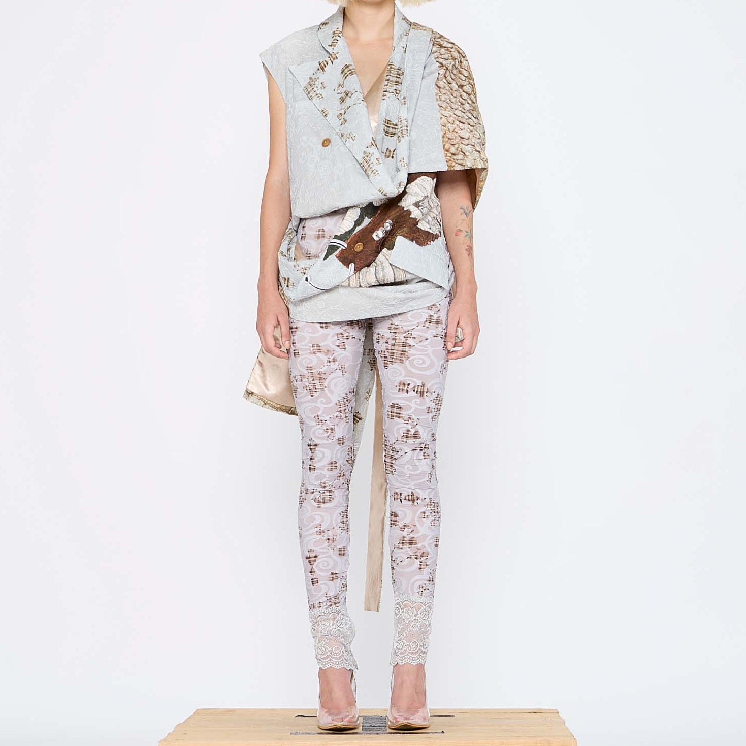 Barbara Bologna Mixed Print Textured Stolla Vest, front view — sleeveless cotton vest with a ollage print featuring crocodile, plaid, and floral patterns, belted at waist