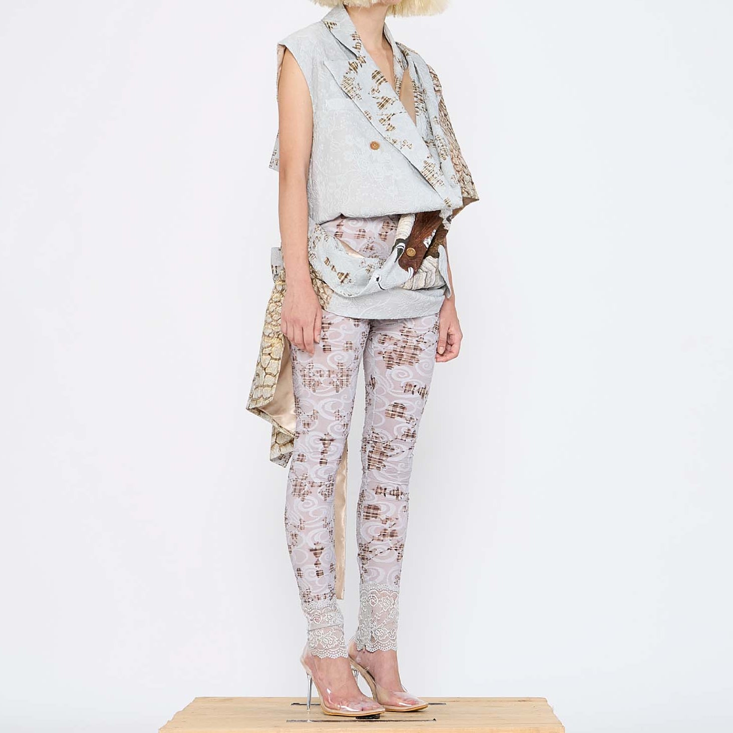 Barbara Bologna Mixed Print Textured Stolla Vest — sleeveless cotton vest with a ollage print featuring crocodile, plaid, and floral patterns, belted at waist
