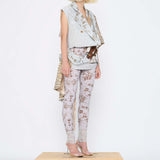 Barbara Bologna Mixed Print Textured Stolla Vest — sleeveless cotton vest with a ollage print featuring crocodile, plaid, and floral patterns, belted at waist