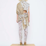 Barbara Bologna Mixed Print Textured Stolla Vest, back view — sleeveless cotton vest with a ollage print featuring crocodile, plaid, and floral patterns, belted at waist