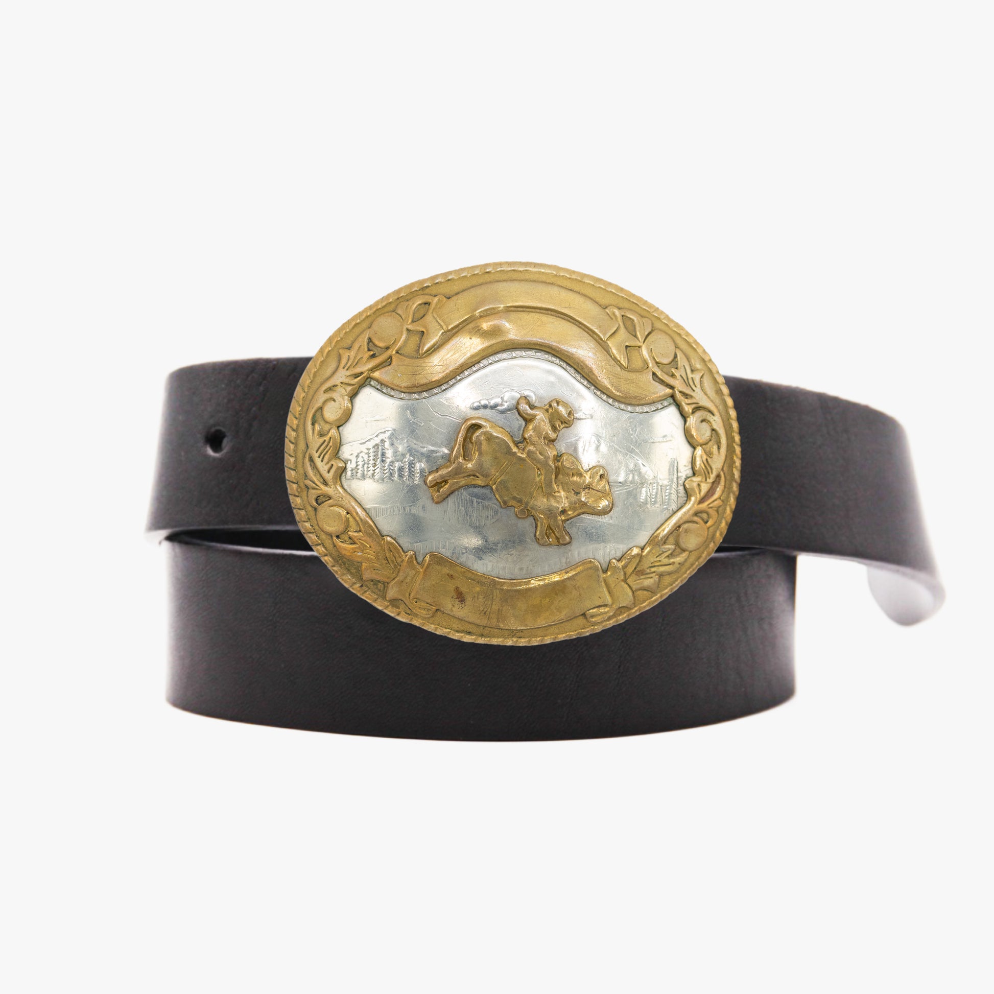 Vintage rodeo buckle and black leather belt