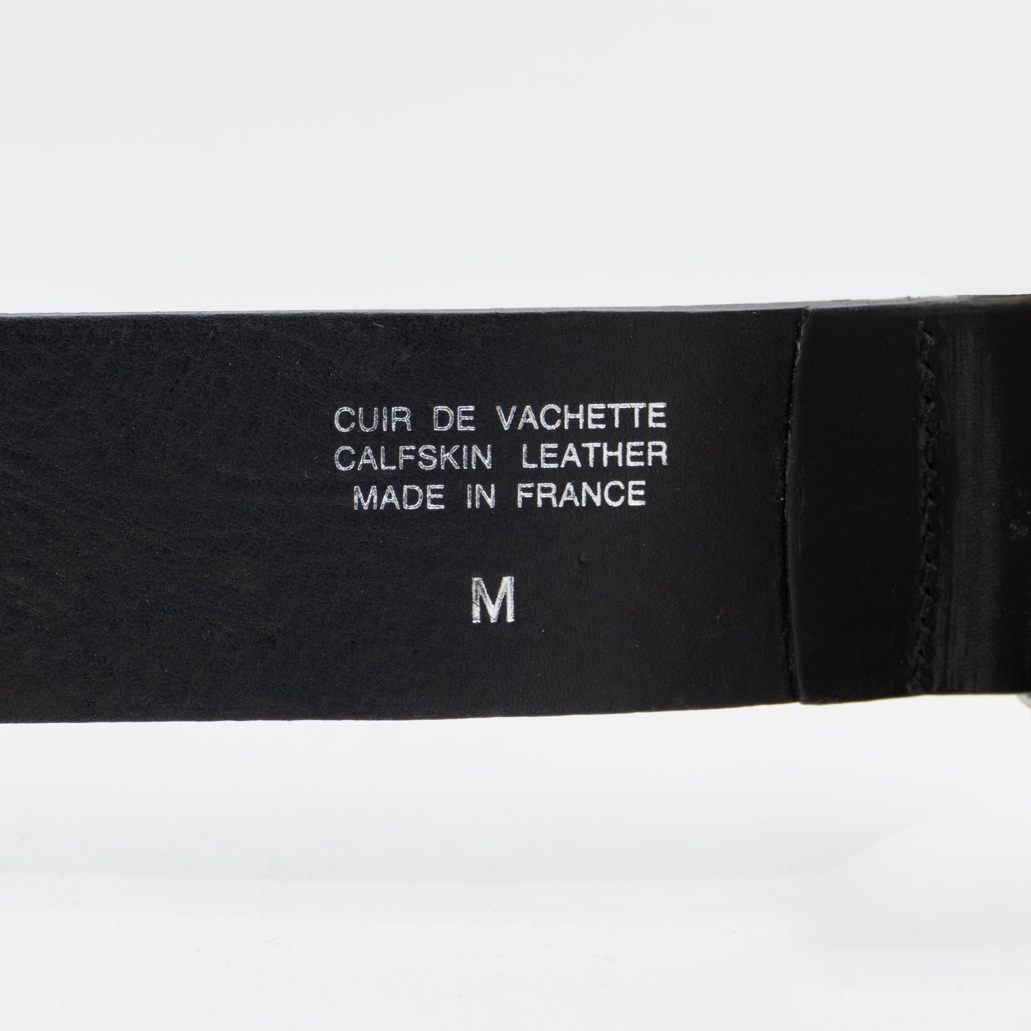 Details stamped on belt
