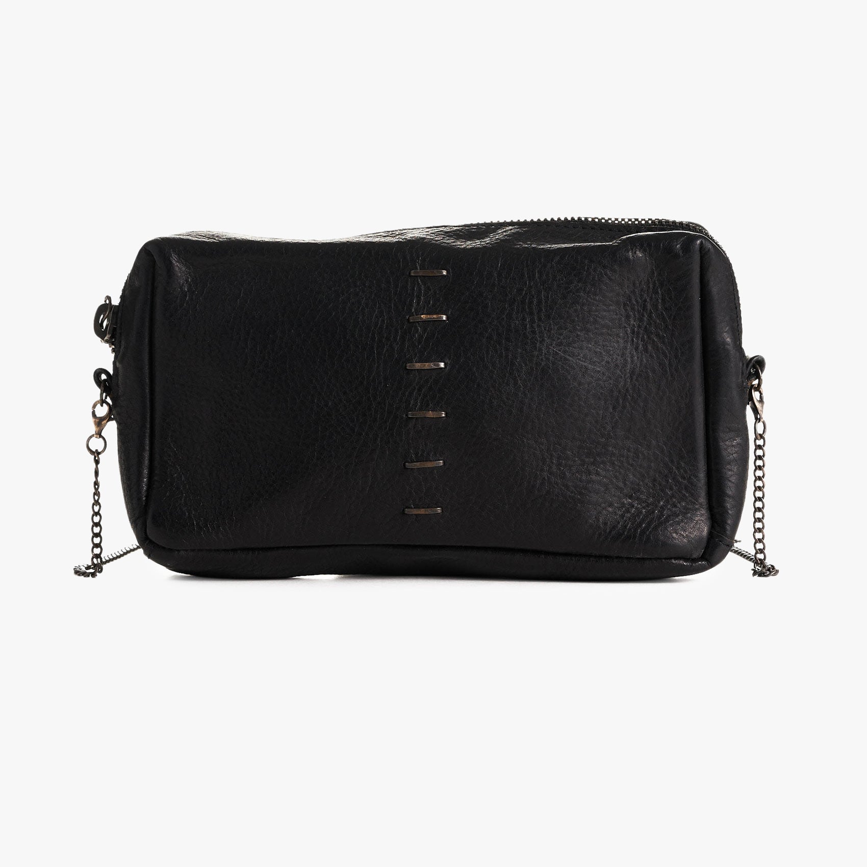 A black textured leather bag with a top zipper, vertical stitched details, and a silver chain strap, shown against a plain white background.