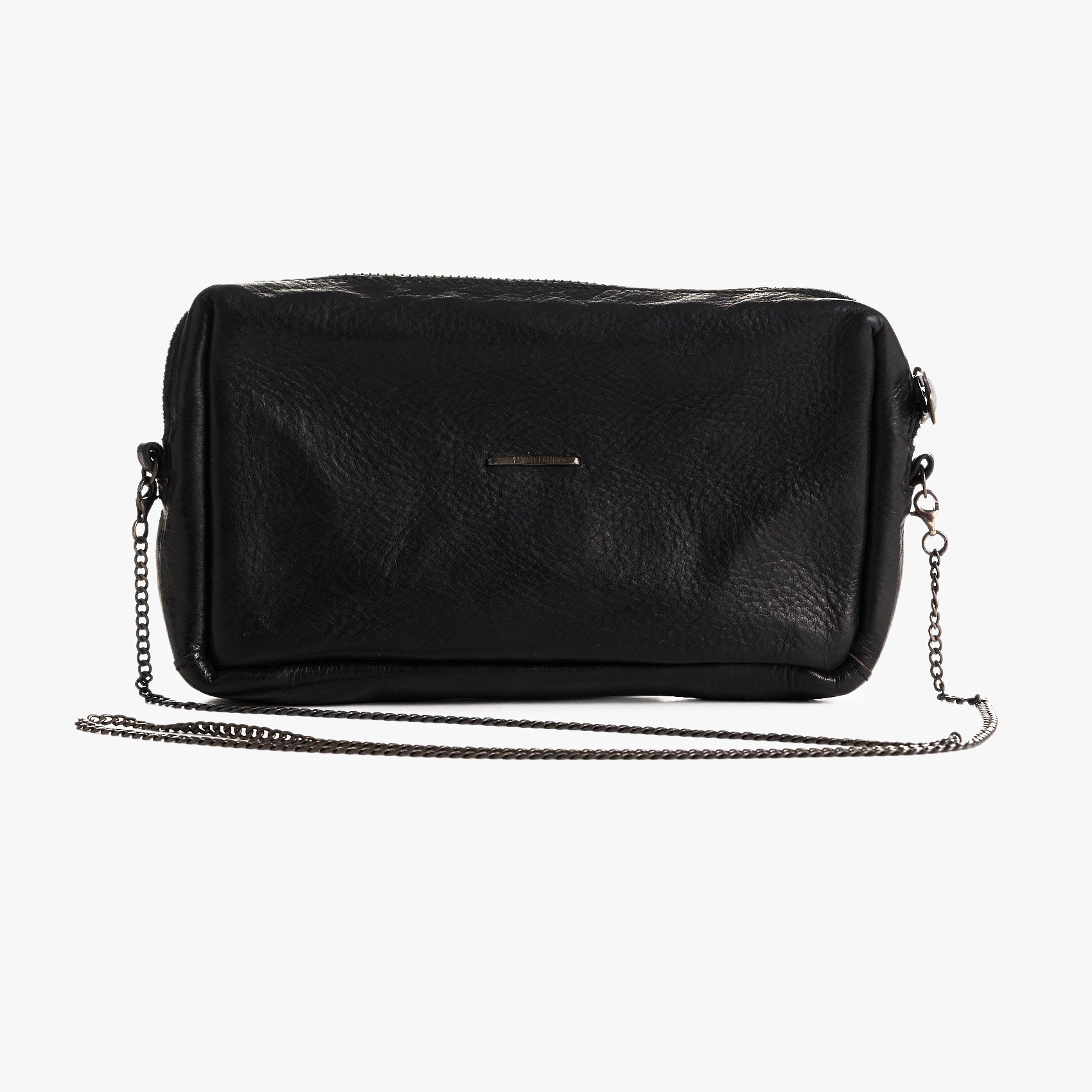 A black textured leather crossbody bag with a silver-tone chain strap and a small horizontal metal plaque on the front, shown against a plain light gray background.