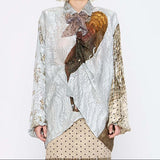 Barbara Bologna Print Shirt with Scarf, front view — collage mixed-print viscose-silk shirt with figurative motif, plaid sleeves, and coordinating sheer scarf tied at collar