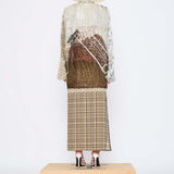 Barbara Bologna Print Shirt with Scarf, back full-body view — collage mixed-print viscose-silk shirt with figurative motif, plaid sleeves, and coordinating sheer scarf tied at collar, styled with a polka dot and plaid skirt