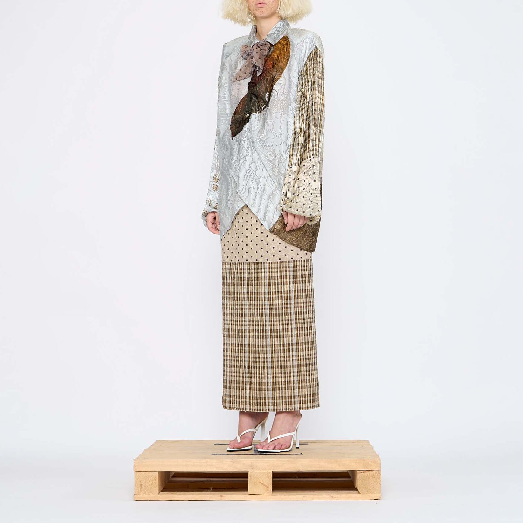 Barbara Bologna Print Pareo wrap Skirt with multiple prints worn by model with Textured Print Shirt from the same collection.