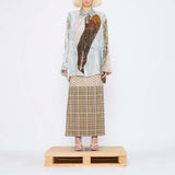 Barbara Bologna Print Pareo wrap Skirt with multiple prints worn by model with Textured Print Shirt from the same collection.