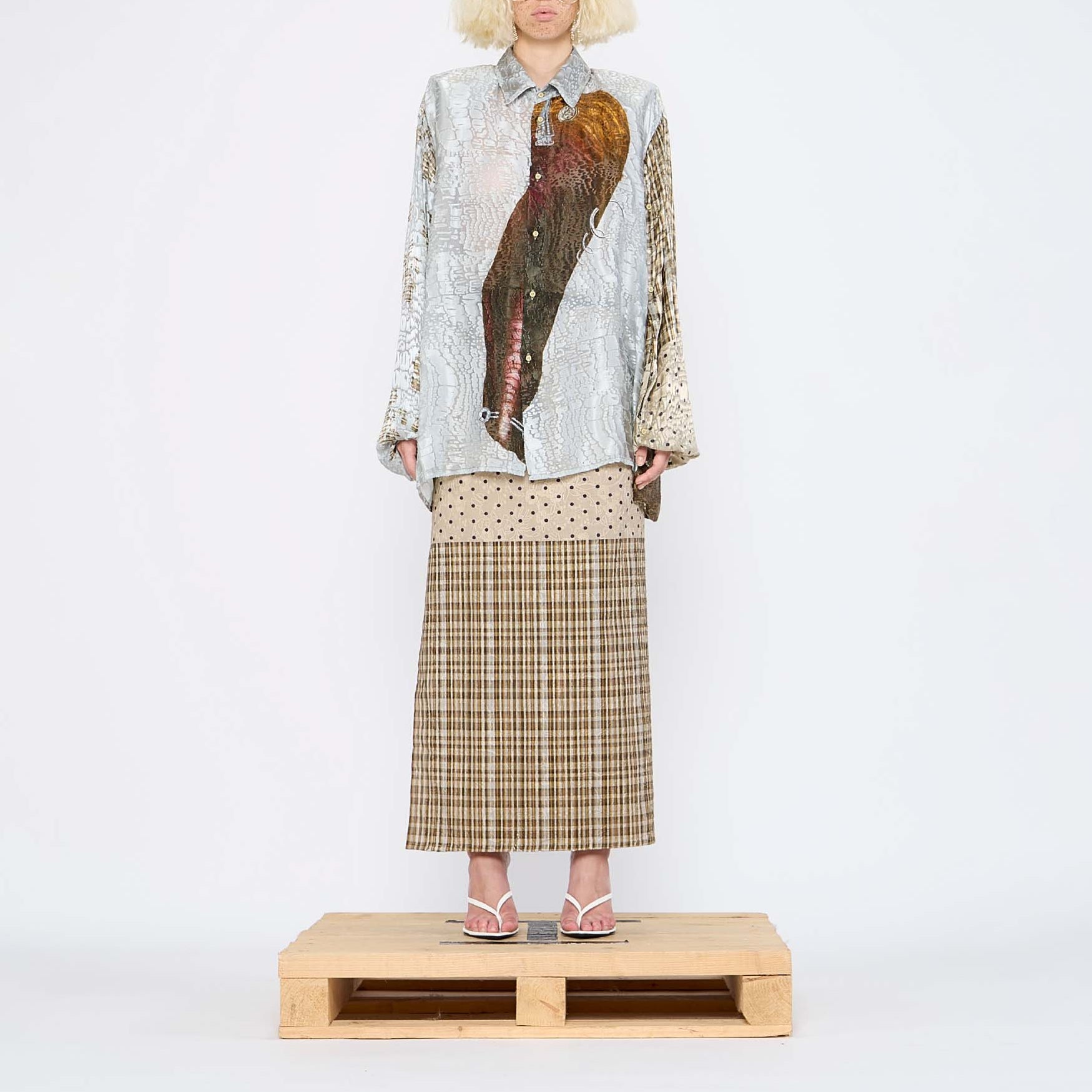 Barbara Bologna Print Pareo wrap Skirt with multiple prints worn by model with Textured Print Shirt from the same collection.