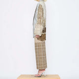 Barbara Bologna Print Shirt with Scarf, side full-body view — collage mixed-print viscose-silk shirt with figurative motif, plaid sleeves, and coordinating sheer scarf tied at collar, styled with a polka dot and plaid skirt