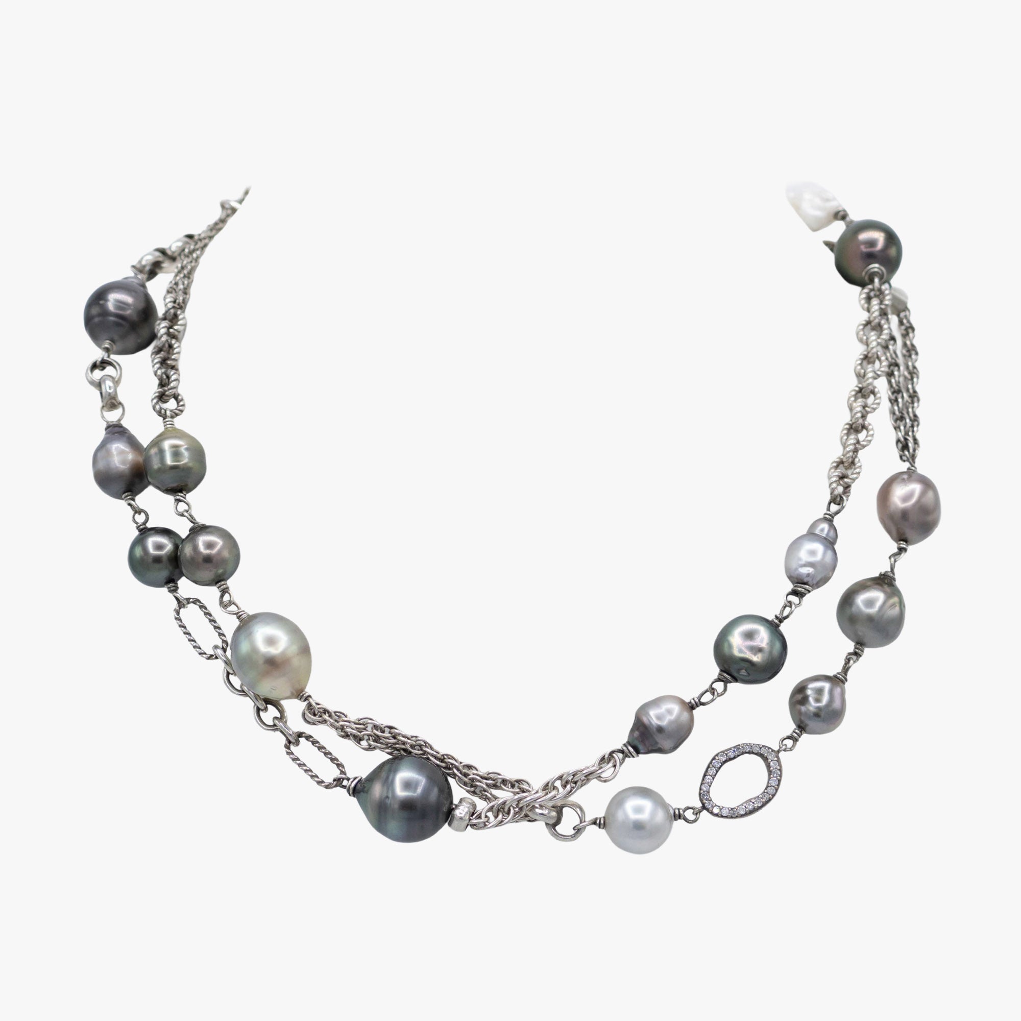 A multi-strand pearl necklace featuring Tahitian and baroque pearls set in silver-tone chains.
