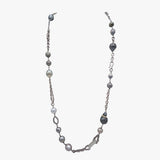 A long pearl and sterling silver necklace