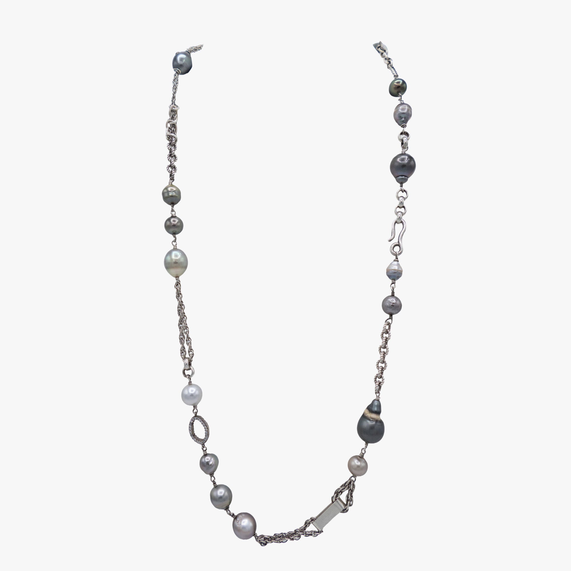 A long pearl and sterling silver necklace
