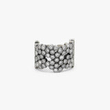 A wide silver cuff ring embellished with multiple rows of diamonds, photographed on a clean white background.