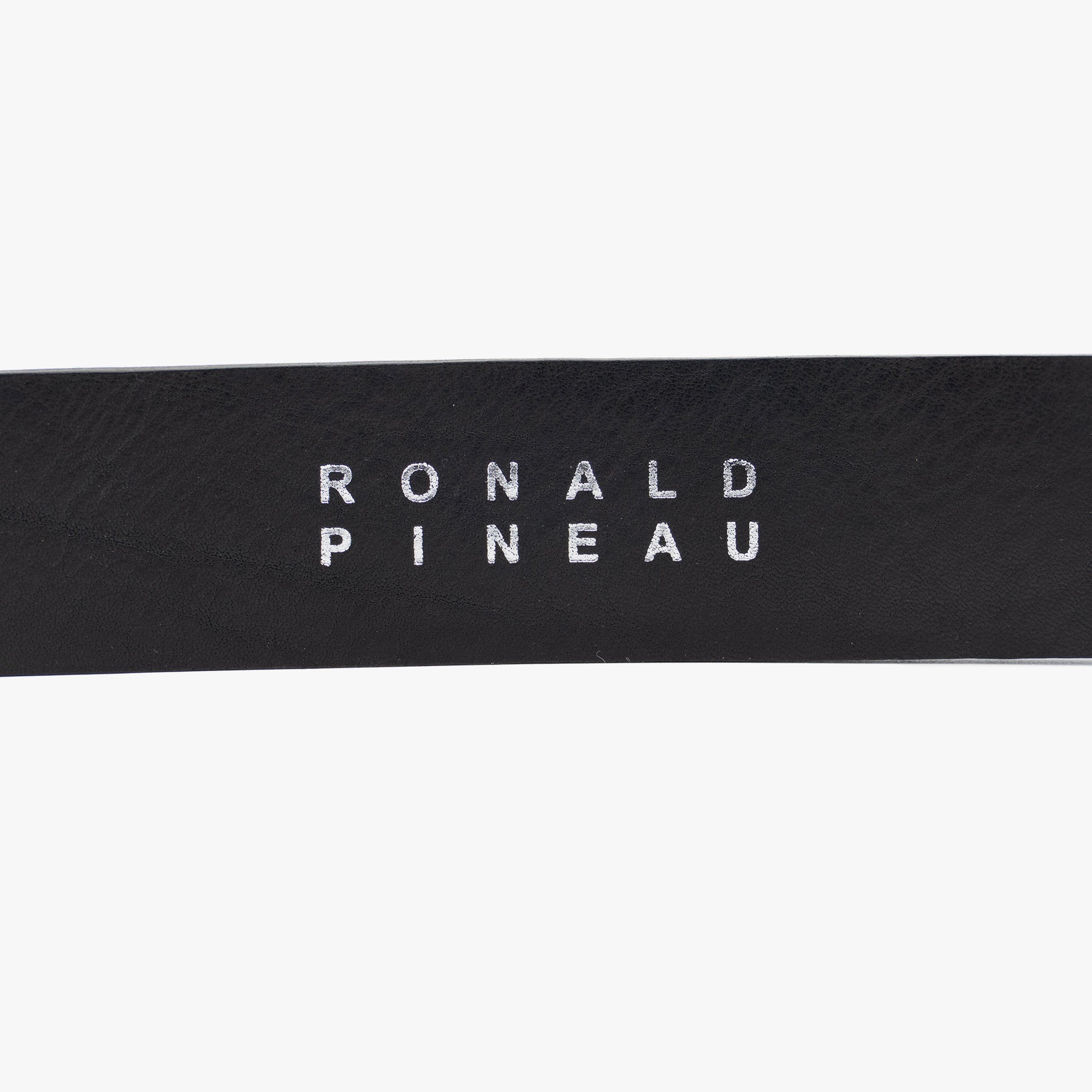 Ronald Pineau Logo stamped on belt