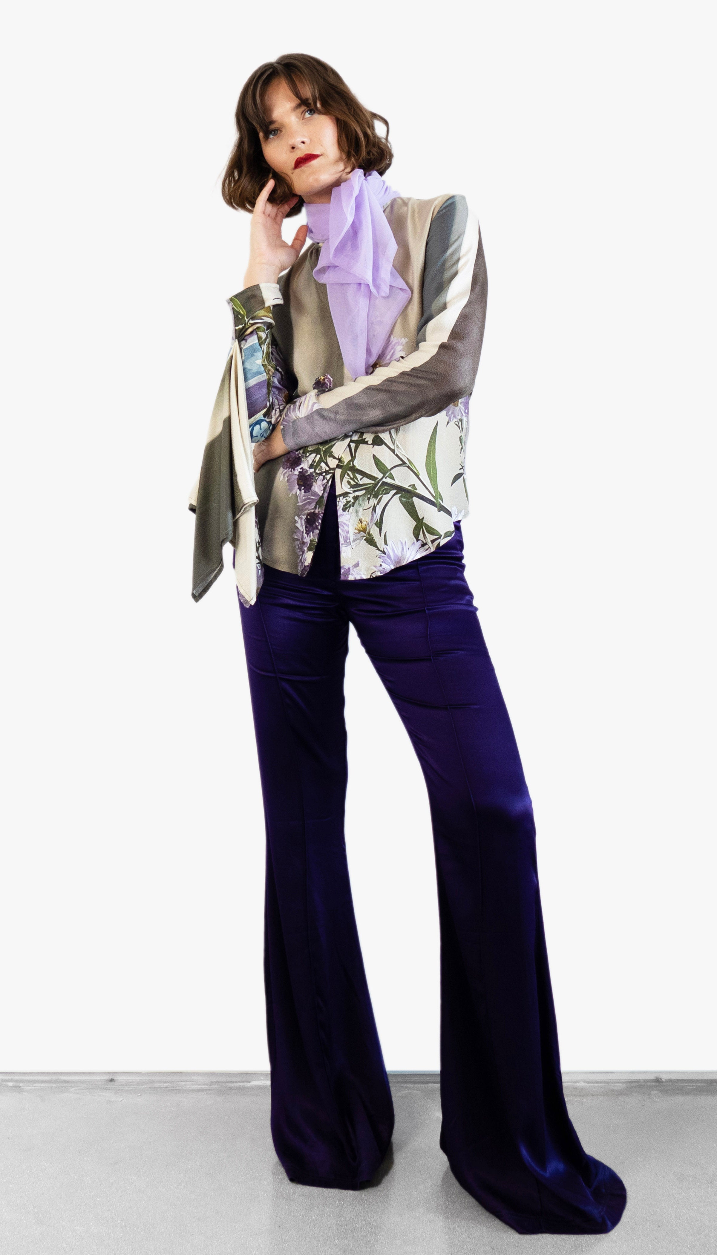 Model wearing Barbara Bologna Blouse with print and purple pants
