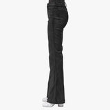 Profile view of a woman wearing black flared jeans