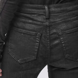 Back pocket detail of black jeans