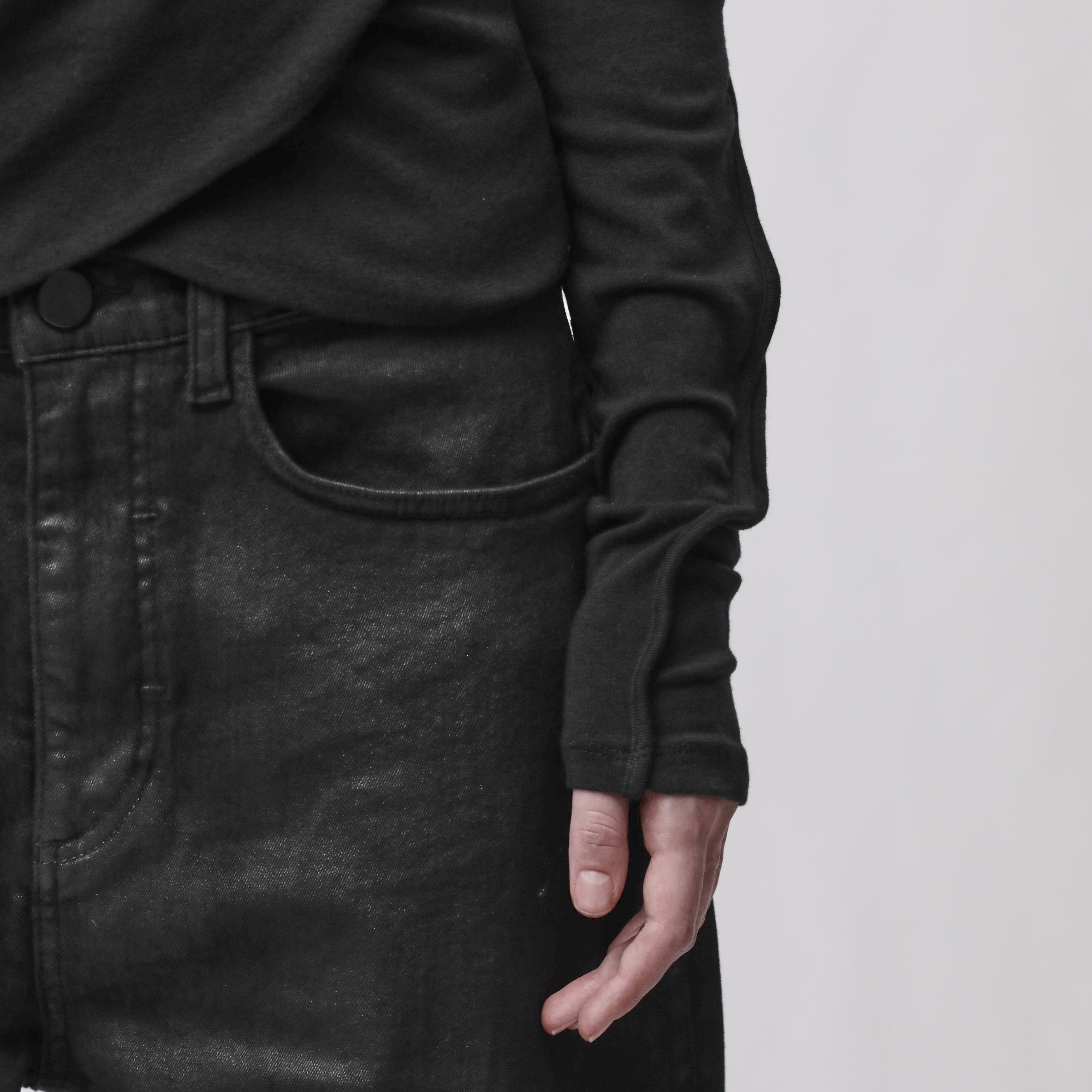 Sleeve detail of a black top