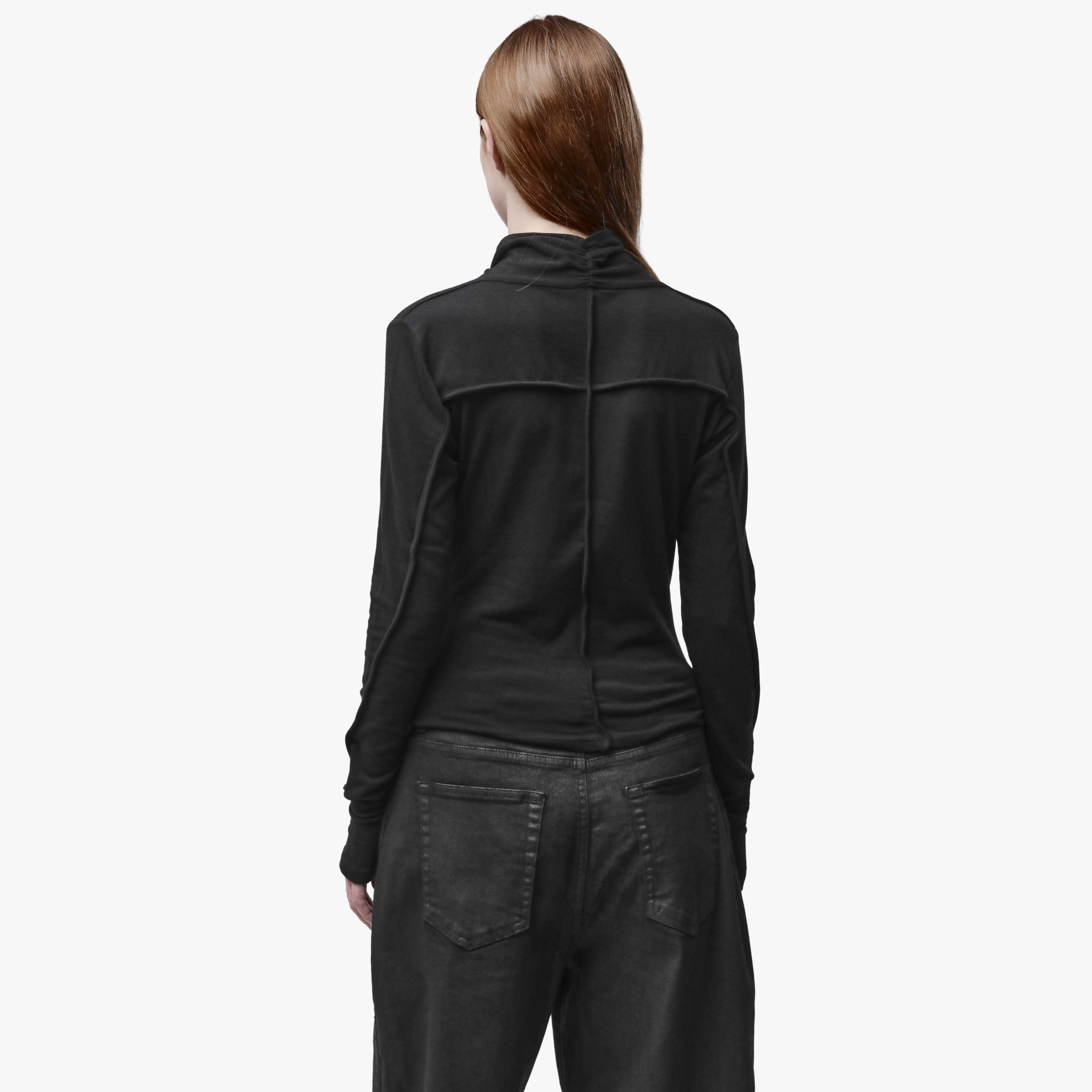 Back view of a woman wearing a black top