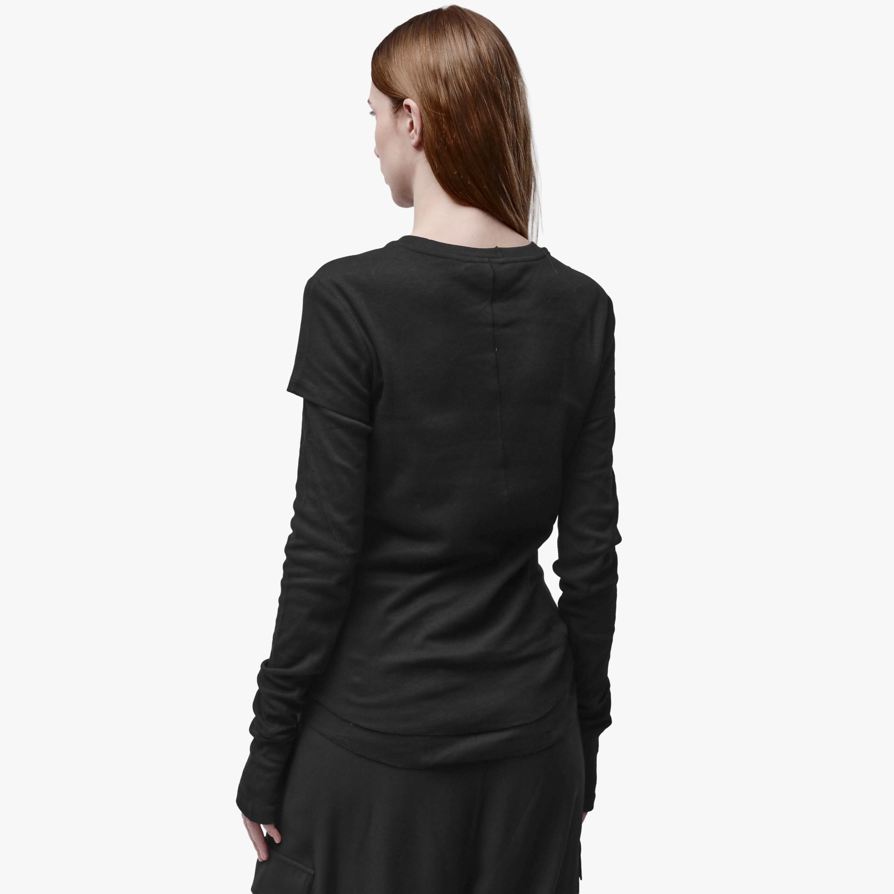 Back of a woman wearing a crew neck t-shirt