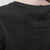 Back detail of a black crew neck t-shirt